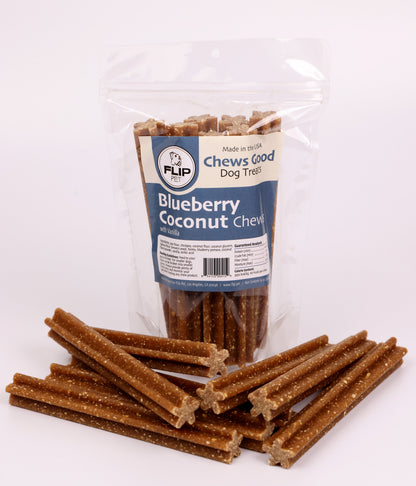 Bag of blueberry coconut dog chews with multiple treats in front on a white background